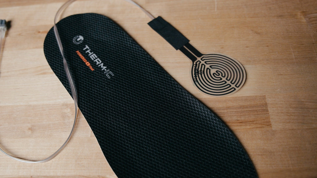 Heated Insoles vs Heated Socks: Which Is Better For Skiing?
